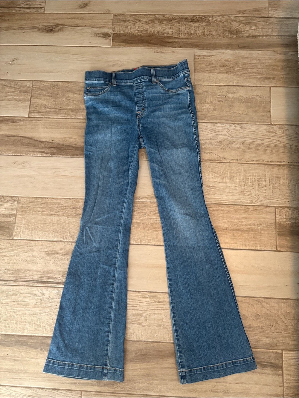 SPANX Denim Flare Jeans in Medium Blue Wash